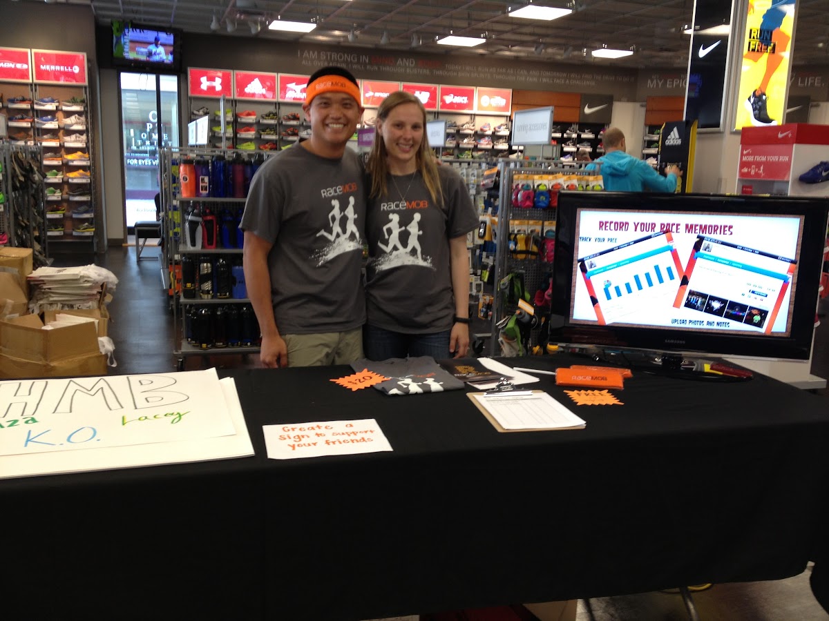 Kevin and Christina at the first RaceMob event with a table, TV, and a dream